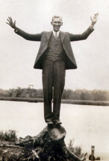 pat clark standing on stump